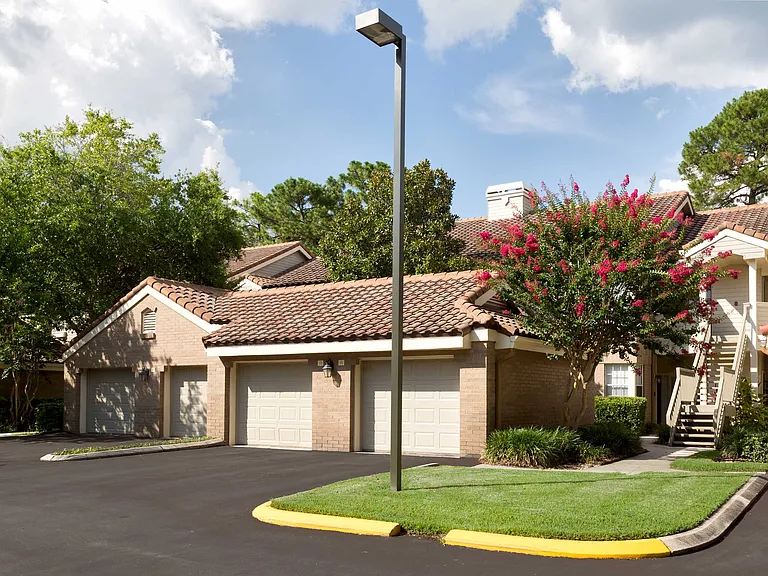 Private Garages with Remote Openers and Overhead Storage