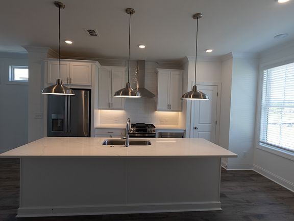 Kitchen Area includes Microwave , Oven ,
Refrigerator