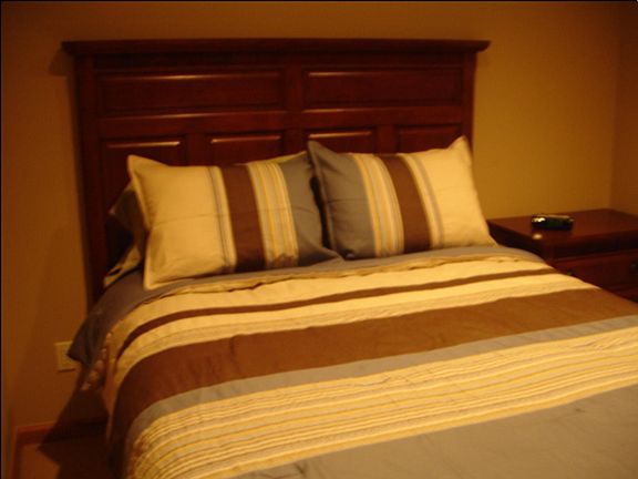 Lower Level ensuite, den area on this level, walk out to ground level tree surrounded patio