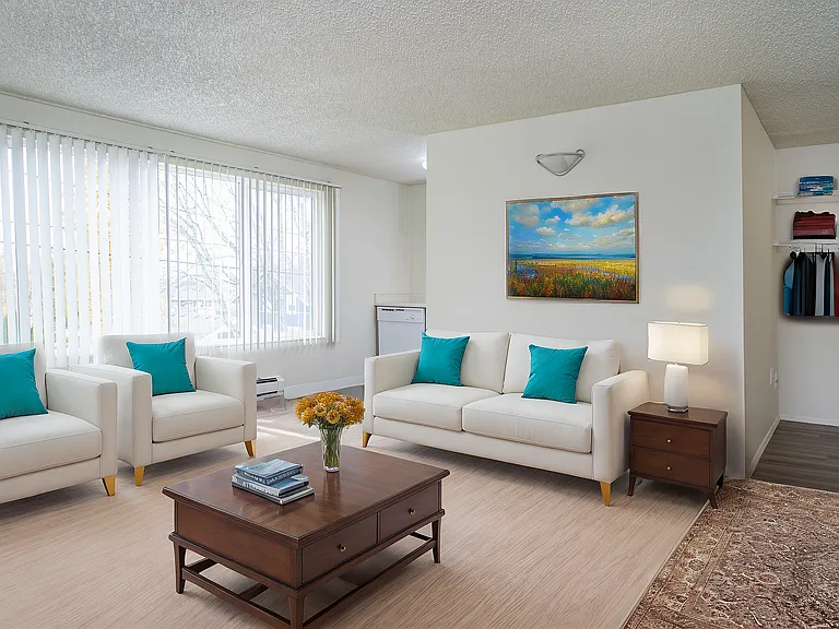 Light-filled living space with a comfortable layout, perfect for relaxing or hosting guests.