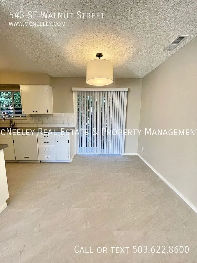 Welcome Home to This Charming Hillsboro Condo! — Photo 3