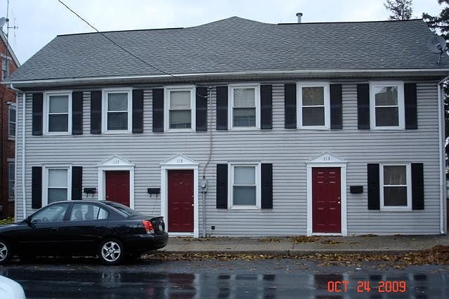Front of house with 3 units in. One on Rt. is for rent. 