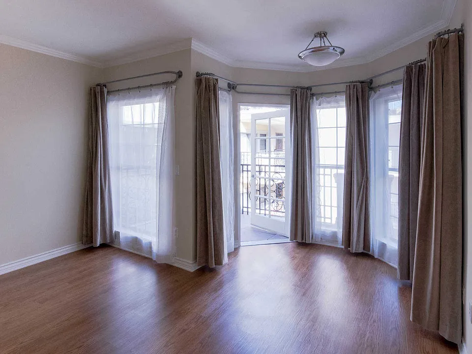 Living Room with Hard Surface Flooring and Balcony
