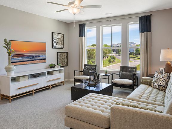 family room with wall of windows