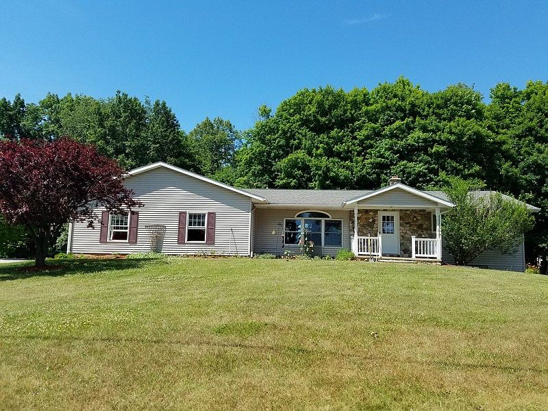 Front of home viewed from 20 Mile Rd
