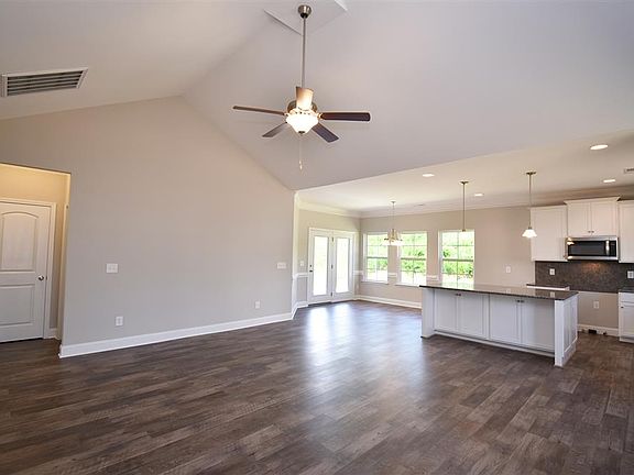 Family room with vaulted ceiling