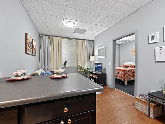 Open-Concept Kitchen and Living Room at University Plaza NIU Apartments