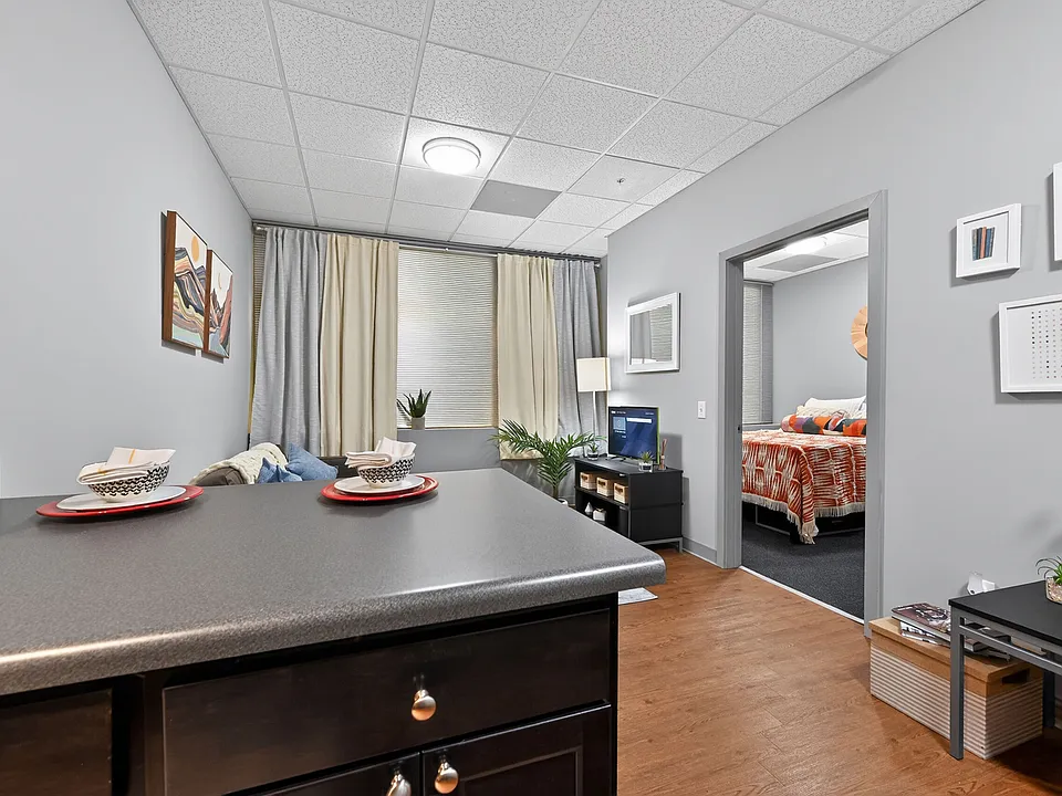 Open-Concept Kitchen and Living Room at University Plaza NIU Apartments