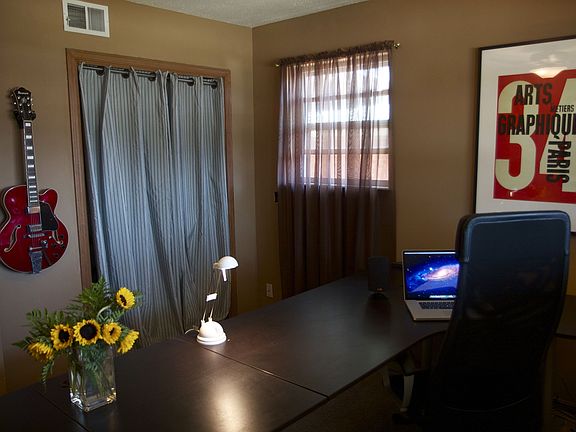 This bedroom is the largest of the three, with updated carpet and a great size