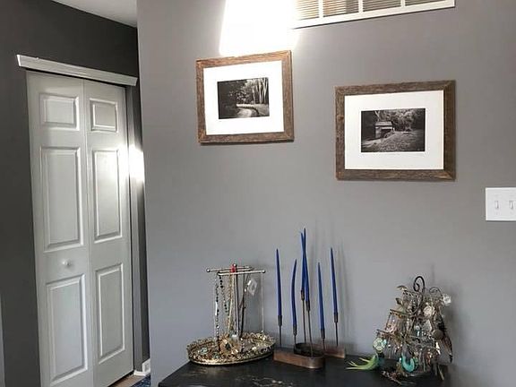 wall in master bedroom leading to bathroom and both walk in 