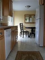 Galley style kitchen all new oak cabinets and Appliances which stay! Gas Stove