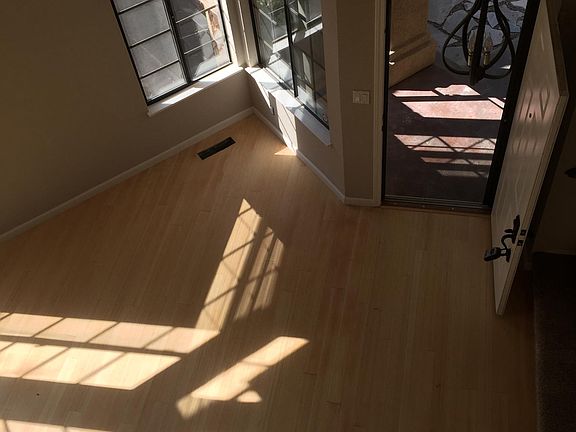Looking down into living room from top of stairs 