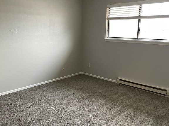 Living room with brand new carpet