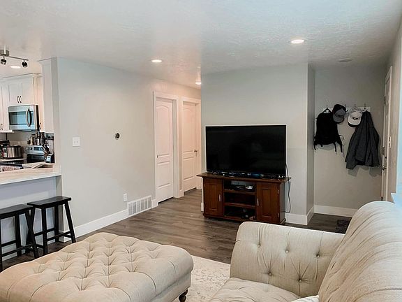 The first door you see is the full bathroom, and the 2nd door leads to the master bedroom.