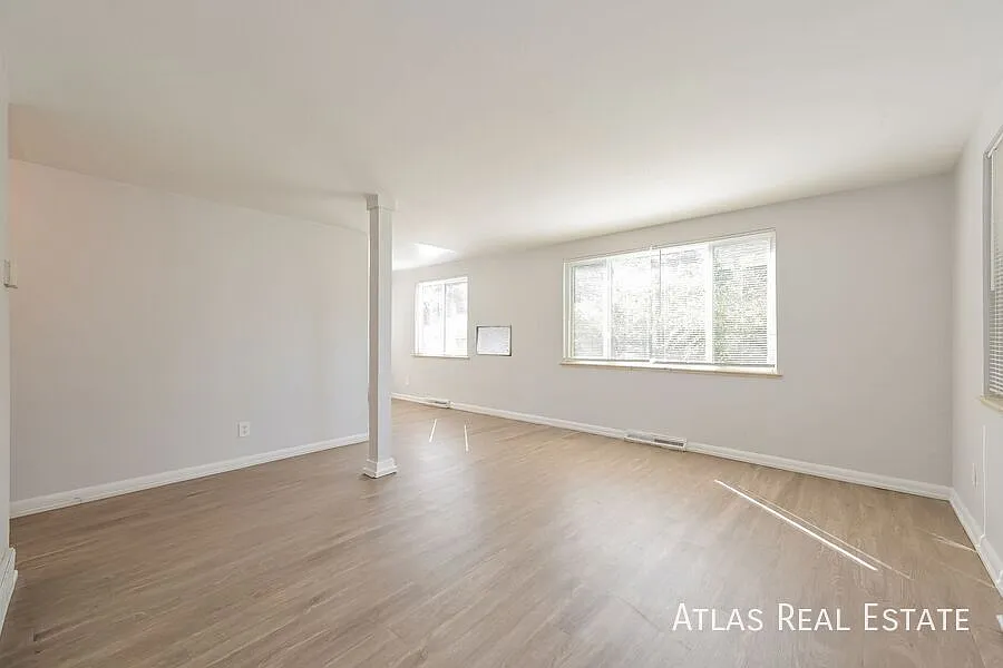 Save up to $1295! Large 2 Bed and 1 Bath Main Level Unit - Abundant Lighting, Hard Floors, Off St... — Photo 3