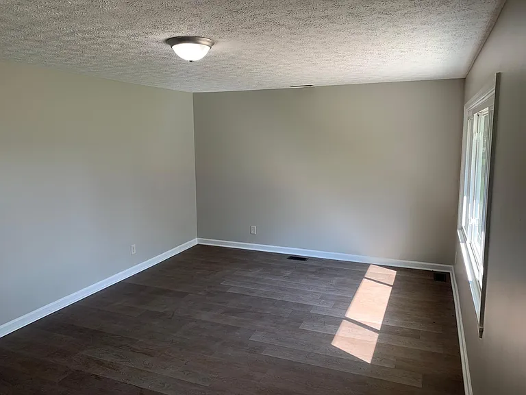 Large living room drenched with sunlight