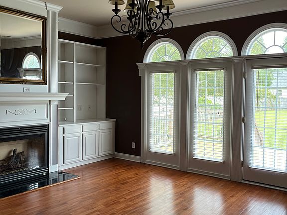 Den with gas fireplace