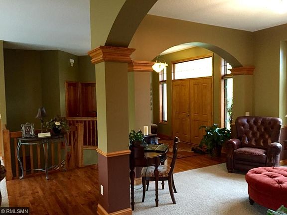 Open the front door to the 12' x 9' open foyer reflecting the quality of this custom built home.