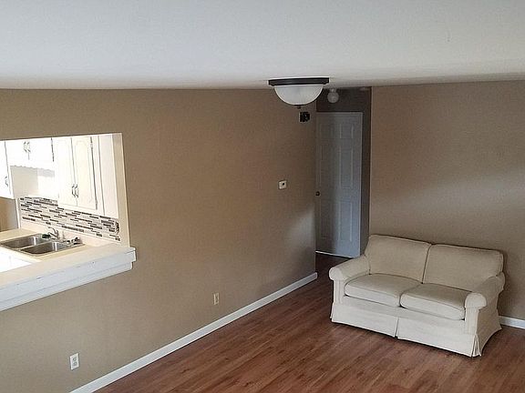 Newly renovated and updated livingroom with open pass throug