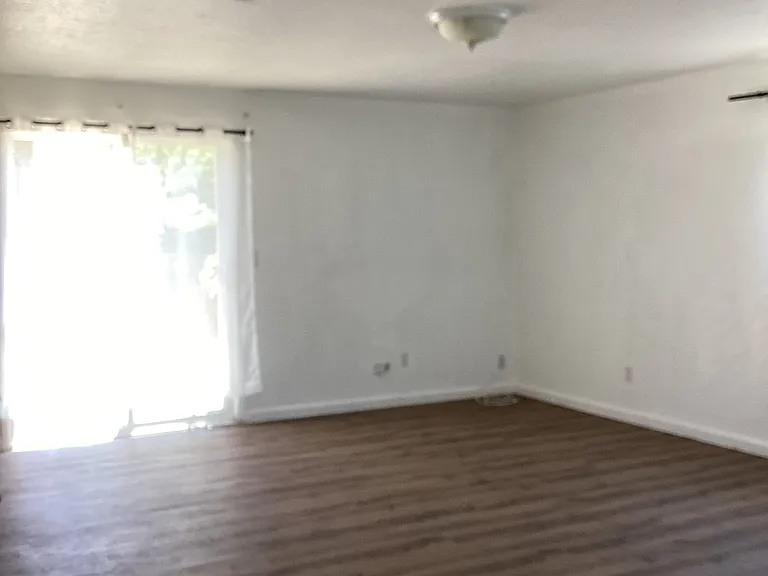 Playroom with sliding door out to backyard.