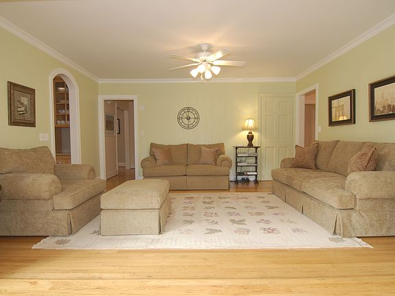 Huge 2nd den opens to bright sunroom