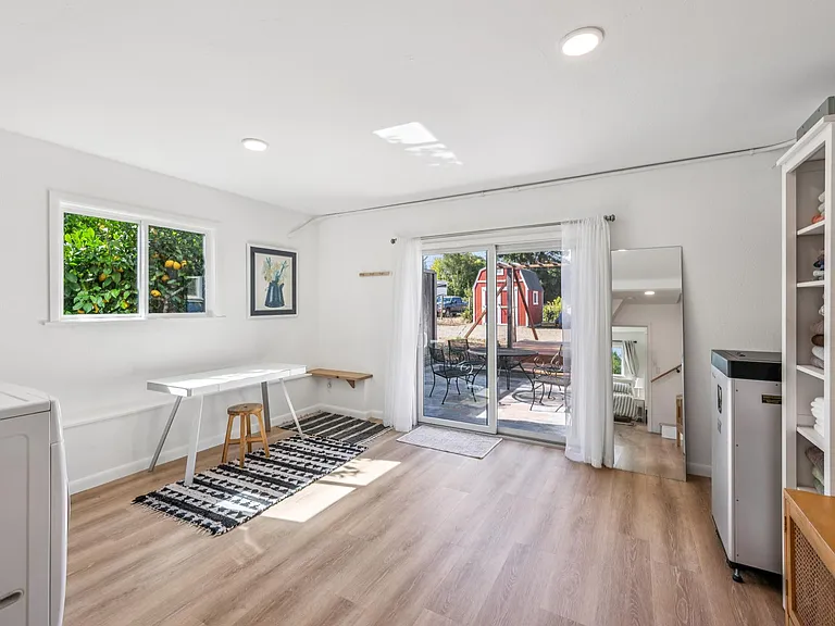 Laundry room with lemon tree view