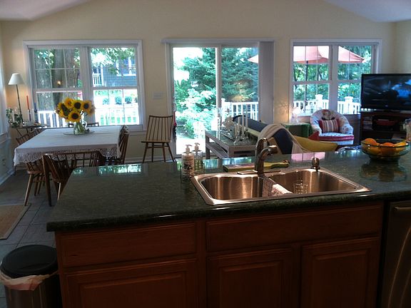 Open kitchen area looking into family and dinning area.