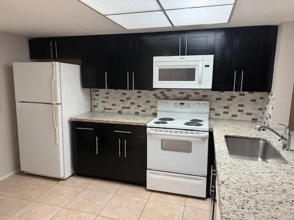 104 Palm Beach Trace Dr, West Palm Beach, FL 33411