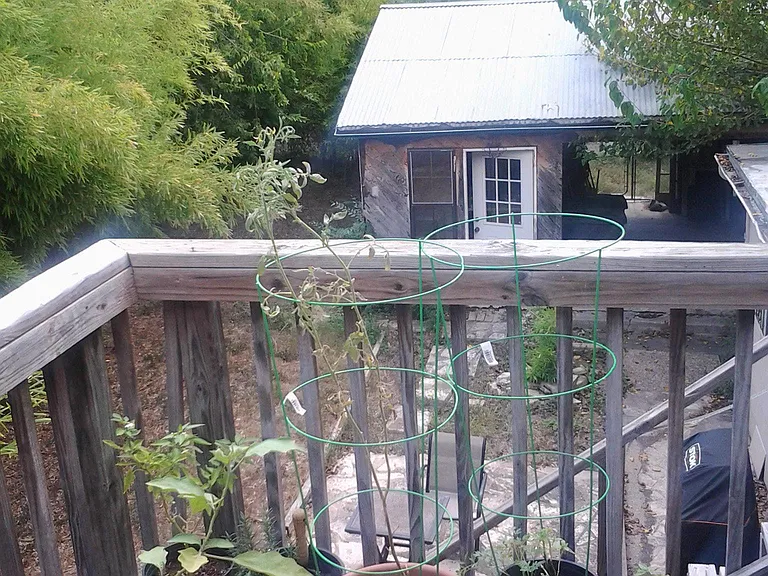 2nd story rear deck for eating, gardening and bbq-ing with w