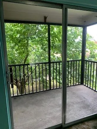 Screened in patio with storage closet