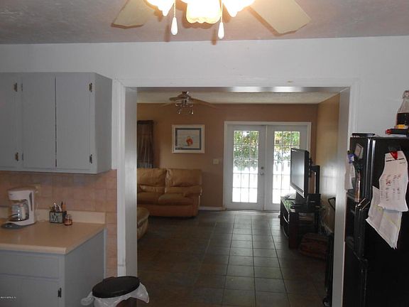 KITCHEN LOOKING INTO LIVING ROOM