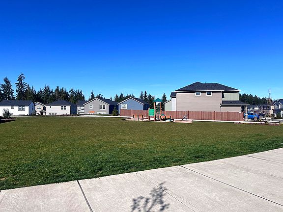 No direct front yard neighbors. And with open green space views.