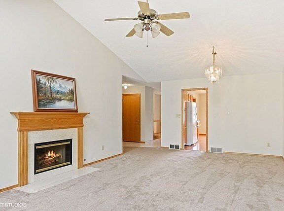 Gas log fireplace to be enjoyed from every angle!