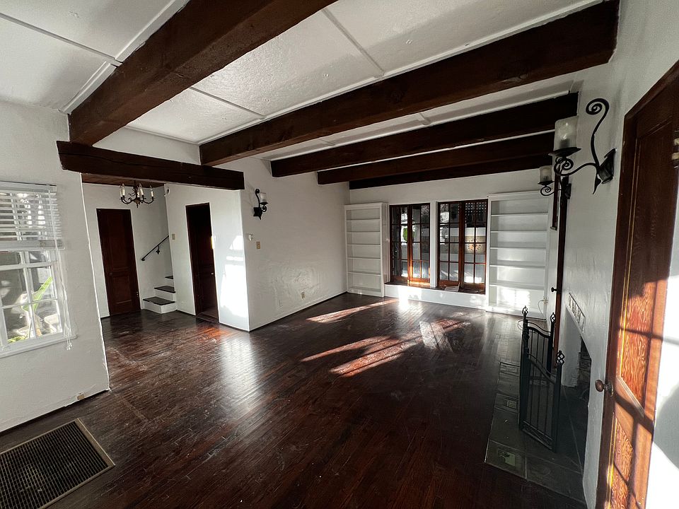 Another view of the living room, strolling a separate entrance near the staircase, along with your living room entrance.