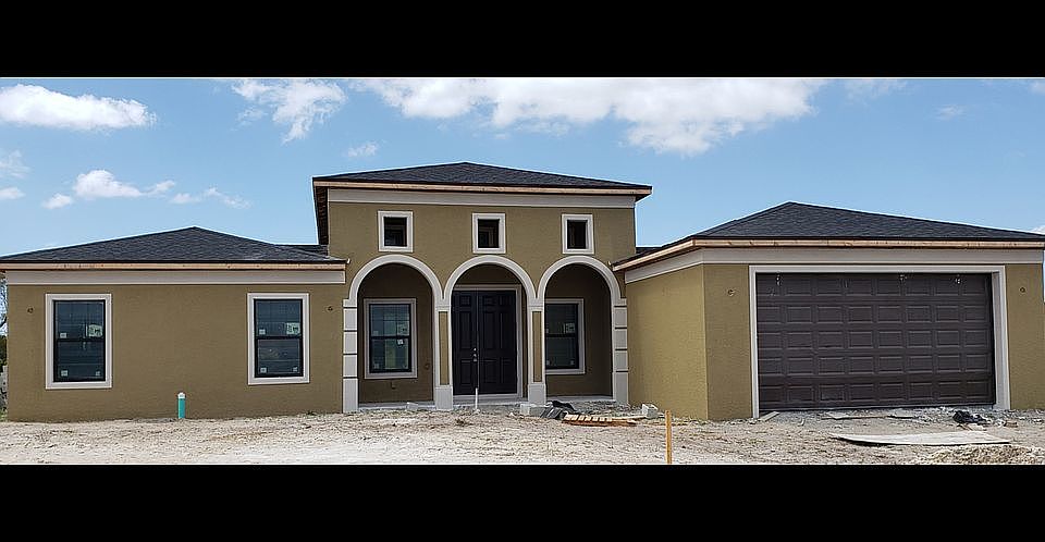 1st image of 114 NW 25th Ave