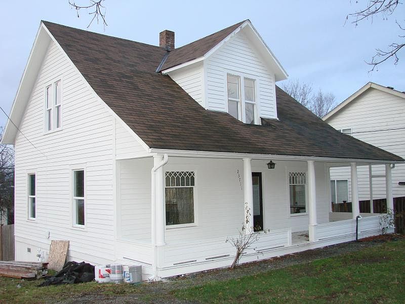 1913 farm house with wrap around porch