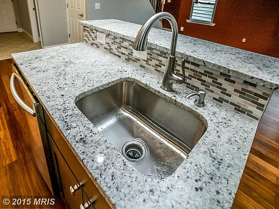 Breakfast Bar with Granite Countertop
