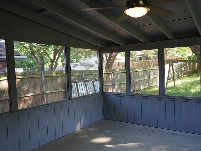 enclosed patio keeps bugs out and provides shade