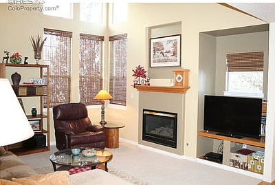 family room with vaulted ceilings