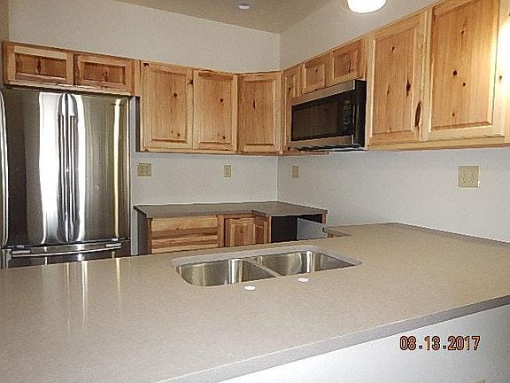 stainless appliances in designer kitchen