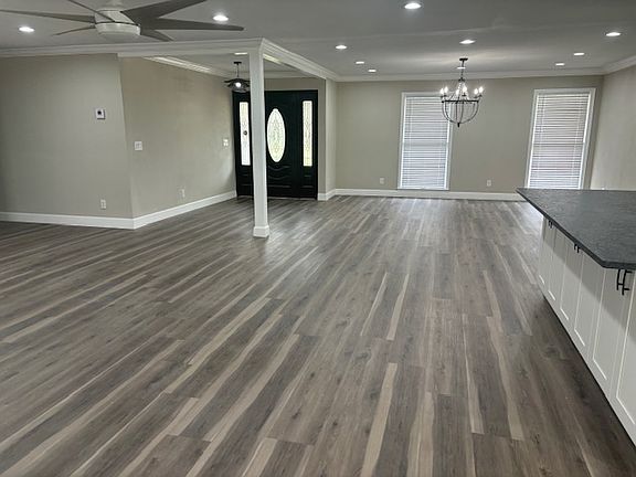 Very open floorplan with luxury vinyl planking throughout & leaded glass black front doors