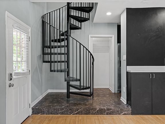 Spiral stairs to the master bedroom