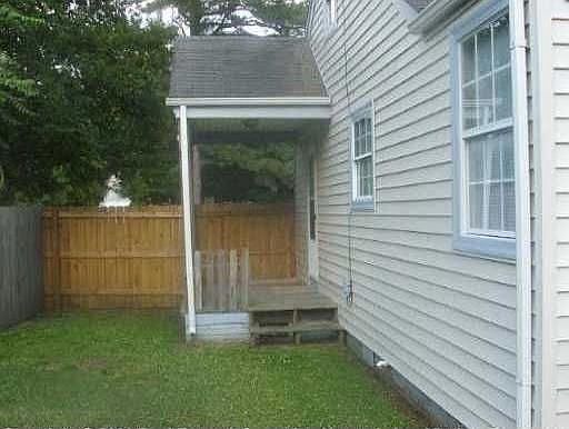 side porch with privacy fence