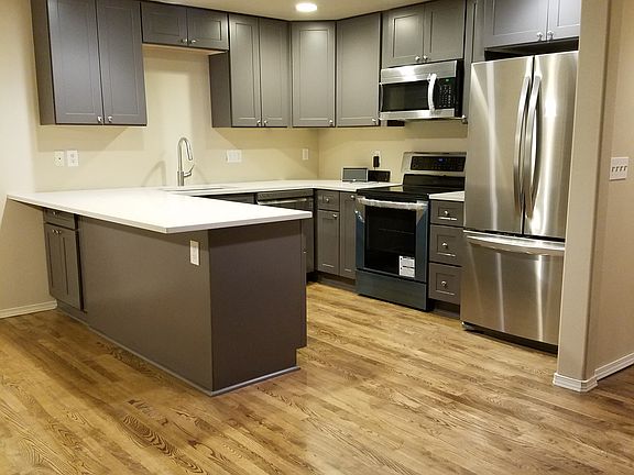 KItchen (Refinished floors + new appliances + new cabinets)