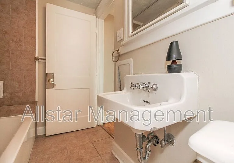 14210 Athens Ave — Photo 13