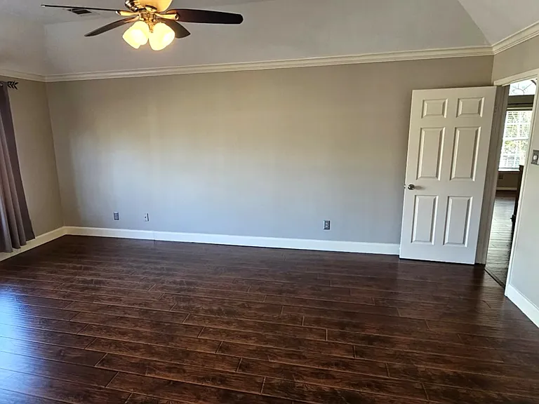 Very large master bedroom easily accommodates a king size bed and additional space for a sitting area
