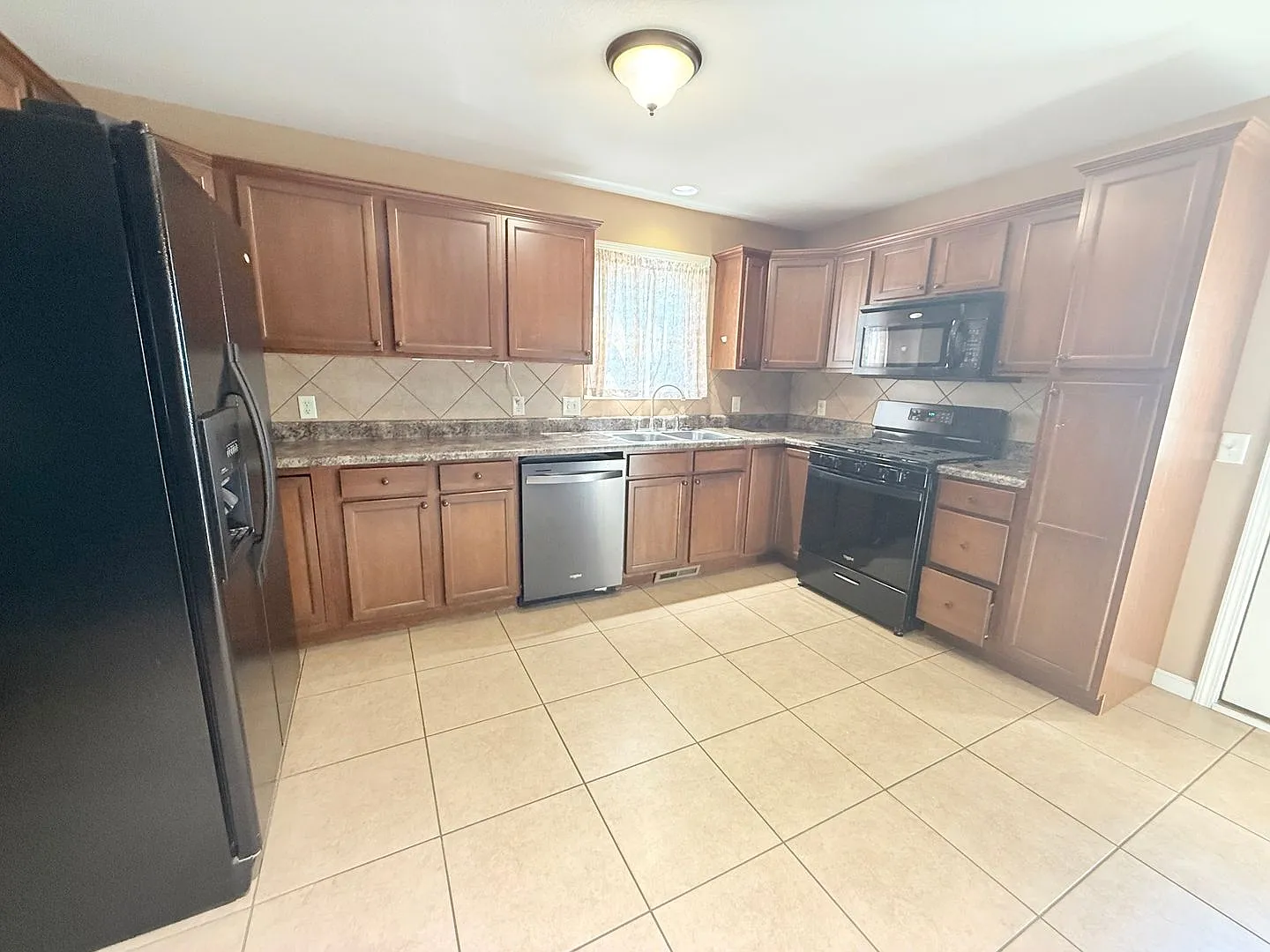 Spacious 4-Bedroom Home with Finished Basement & 2-Car Garage — Photo 2