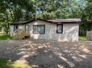 7400 W 10 1/2 Mile Rd, Irons, MI 49644