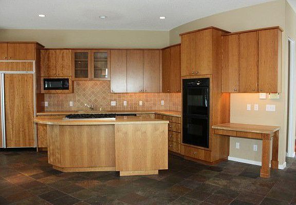 Gourmet kitchen with Sub Zero fridge, Viking range and double wall oven.