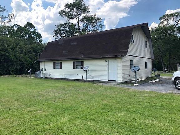 Apartment 11 is the top floor of this duplex. Lots of green space that is maintained by the owner!
